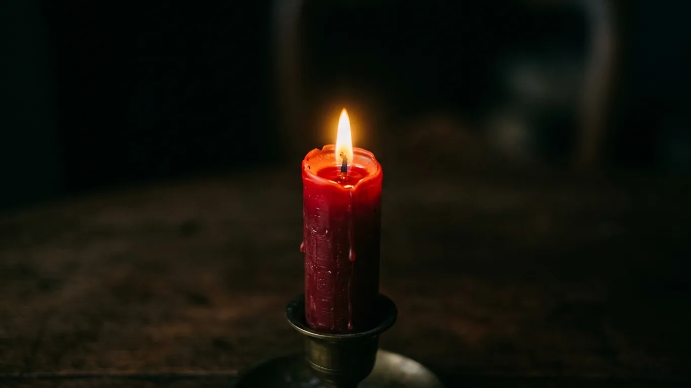 Burning red candle