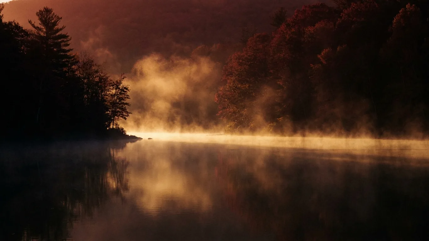 Fog lifting from a lake